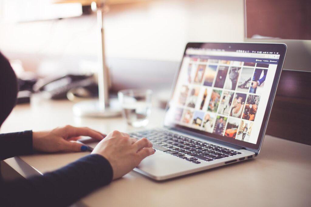 A person using laptop.